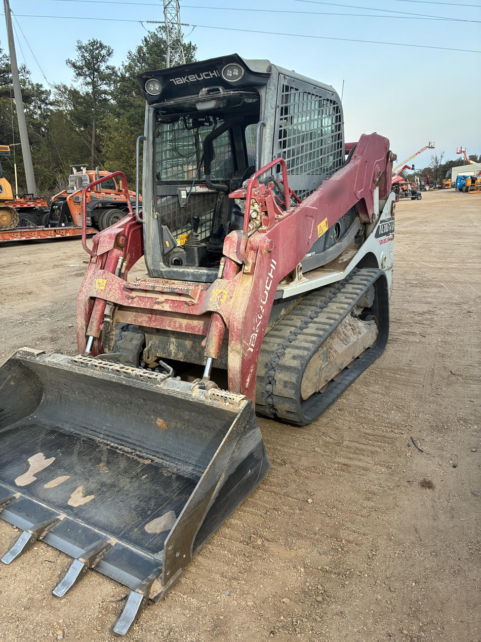 2019 Takeuchi TL10V2-CR Cab/Heat/AC, Rubber Tracks, Backup Alarm, Front & rear working Lights, Auxiliary Hydraulics, 2 Speed Travel, Engine Monitoring System, Hydraulic universal quick hitch w/76" HD dirt bucket with 8 teeth, 20.3 cubic feet capacity, 48" Pallet forks and frame