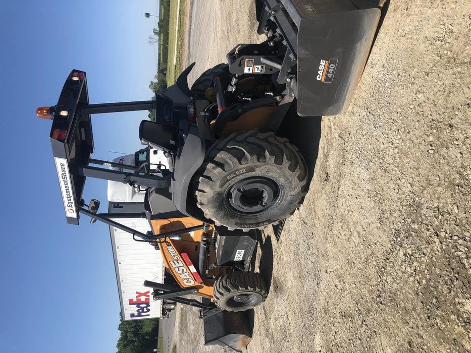 2019 Case 570N EP Canopy, 4WD, GP Front Bucket, Dual Tilt Cylinder, 84" Box Blade w/ Scarifier, Wheel Weights, Beacon