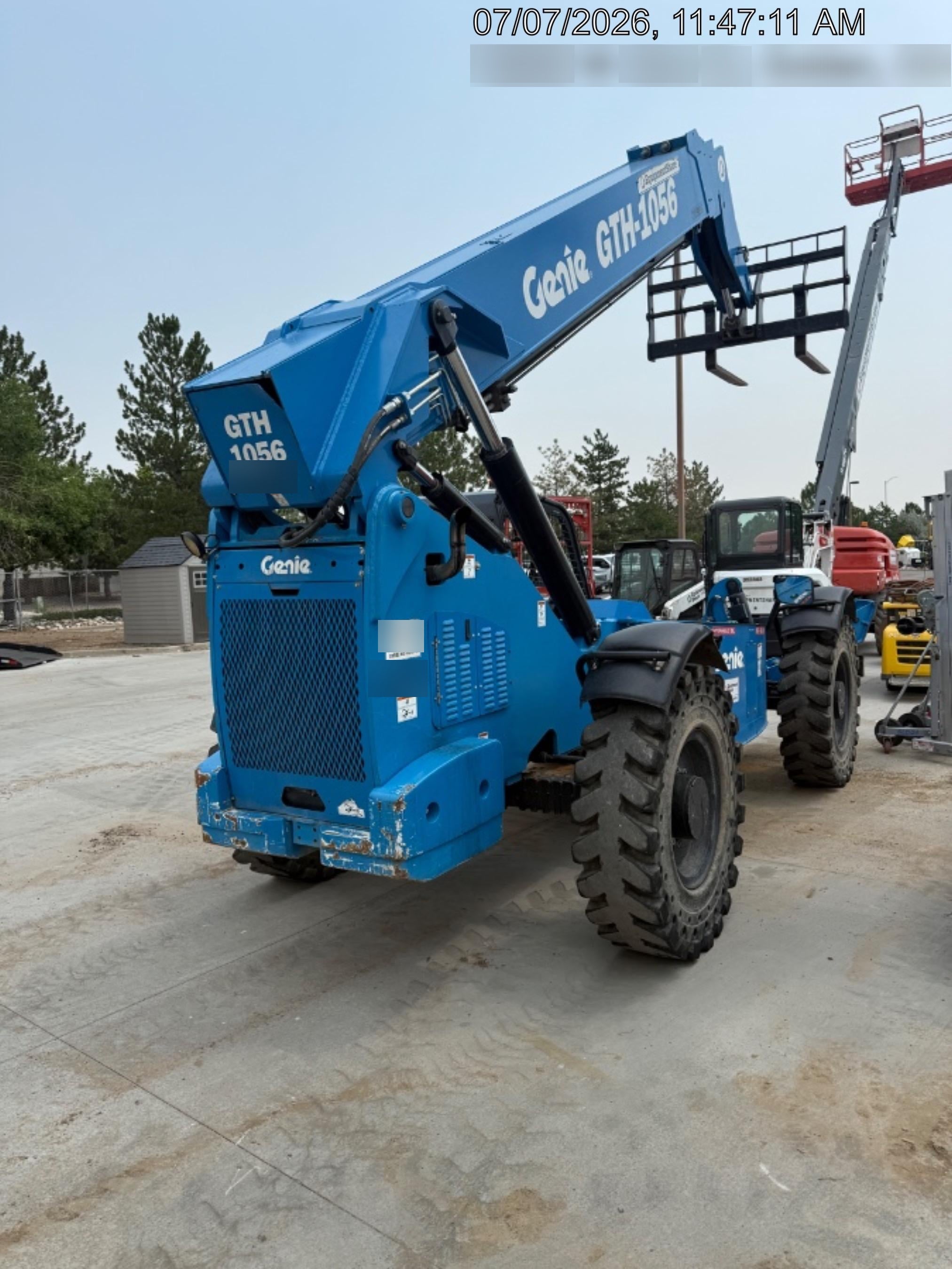 2018 Genie GTH-1056 Genie GTH-1056 w/Open ROPS, Solid Tires, Work Lights, 60" carriage/forks, cab mesh, beacon
